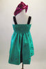 Green taffeta smocked back bubble dress has large crystaled bow accent that covers the bust & pink crystal accents. Comes with pink sequined beret & pink gloves. Back