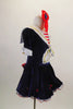 Dark blue velvet dress has white crinoline & red star accents. The large white naval collar has front tie & striped inlay. Collar hash gold piping & red stars. Comes with large red hair bow. Right side