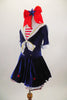 Dark blue velvet dress has white crinoline & red star accents. The large white naval collar has front tie & striped inlay. Collar hash gold piping & red stars. Comes with large red hair bow. Left side