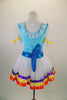 Doll themed ballet dress with blue glitter velvet bodice has blue ribbon accent, sheer white skirt with lace trim & pouf sleeves. Has wind-up plush key at back. Comes with matching hair bow. Back