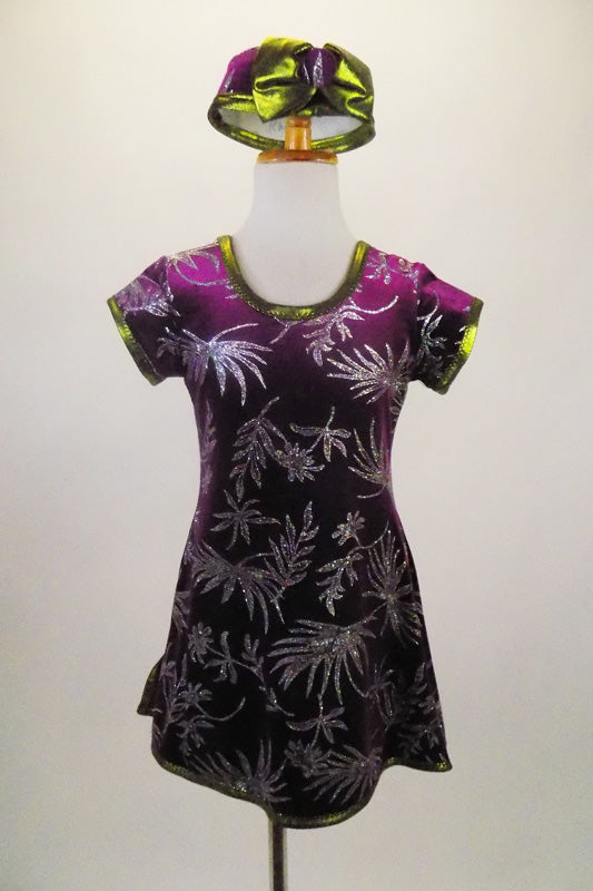 Purple velvet tunic dress has glitter silver fern leaf patterns throughout. The banding is a metallic olive green. Comes with matching pill hat. Front