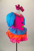 Bright pink clown themed leotard dress has turquoise pouf sleeves, neck ruffles & buttons. Skirt is layers of turquoise orange & pink sequined ruffles. Comes with hair bow. Side