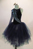 Stunning navy blue velvet full romantic tutu has one shoulder long sleeved bodice accented with 3-D lace of blue floral & green-silver peacock tail feathers. Comes with hair accessory. Left side