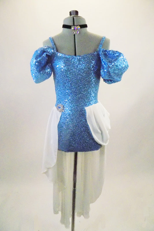Cinderella themed costume is a blue sequined camisole leotard with long white attached open front chiffon skirt cascading from crystal jeweled brooch at hip. Front