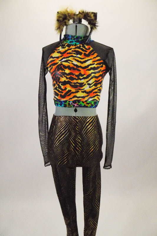 Animal themed long sheer sleeved half-top is black sheer with tiger print torso & keyhole back. The leggings are black with unique gold tiger stripe pattern. Front