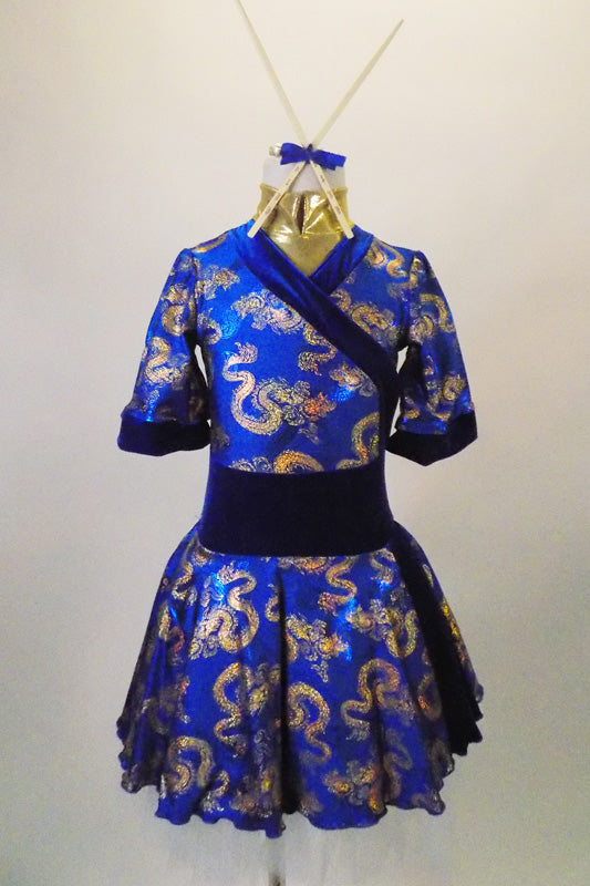 Kimono inspired costume has royal blue & gold  dragon print with deep blue velvet trim.  Blue velvet waist attaches the skirt. Comes with chopstick barrette. Front