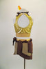2-piece costume has gold half-tank with keyhole back and brown sequined neckline. Matching skirt has gold brief with angled pieces of brown & beige fabric. Comes with feather headband. Back