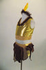 2-piece costume has gold half-tank with keyhole back and brown sequined neckline. Matching skirt has gold brief with angled pieces of brown & beige fabric. Comes with feather headband. Left side