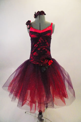 Rich red & purple jewel tone lace make the bodice of tutu dress. Long crystal tulle layers of red and purple are accented by roses on left hip, right shoulder. Comes with matching rose hair accessory. Front