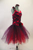 Rich red & purple jewel tone lace make the bodice of tutu dress. Long crystal tulle layers of red and purple are accented by roses on left hip, right shoulder. Comes with matching rose hair accessory. Right side