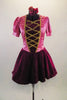 Pink satin & wine velvet peasant style ballet dress has cuffed pouf sleeves, gold lacing on burgundy center & a velvet skirt on layers of white crinoline. Comes with separate brief and hair accessory. Front
