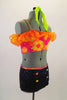 Bright neon colored floral print off-shoulder half top, has orange taffeta ruffle & nude reinforcing straps. Navy sequined brief has neon buttons & waistband. Comes with neon green hair scarf. Side