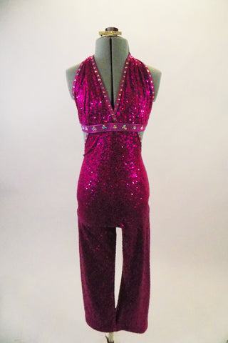 Fuchsia sequined capri-length unitard has triangle bust low back & halter neck edged with crystals. Crystalled bust-line band wraps to the back.  Comes with hair barrette  Front
