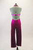 Fuchsia sequined capri-length unitard has triangle bust low back & halter neck edged with crystals. Crystalled bust-line band wraps to the back.  Comes with hair barrette 