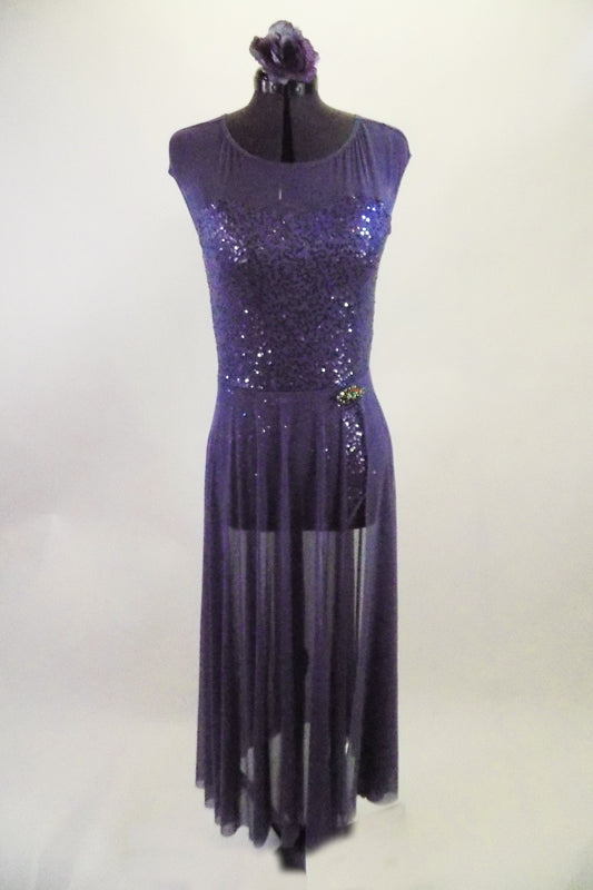 Sequined periwinkle leotard dress has sheer mesh upper, keyhole back & attached long flowing skirt with slit on side. Comes with jeweled brooch & hair accessory. Front