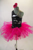 3-piece costume has black & silver striped, one shoulder unitard base. The base is paired with pink bengaline vest. Has pink, crystal tulle pull-on tutu skirt & floral hair accessory. Side without vest