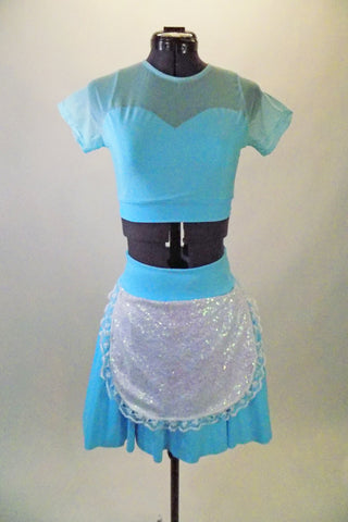 Pale blue 2-piece costume has full petticoat skirt with attached white sequined apron & matching half-top with sheer upper, cap sleeves & sweetheart bust line. Comes with black bow hair accessory. Front