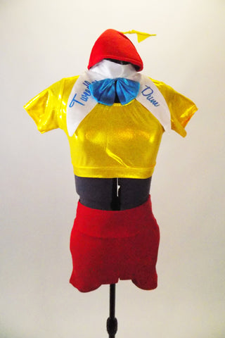 Alice in Wonderland themed costume has yellow short sleeved half-top & red high waist shorts. There is a detachable large white collar with name & beanie hat. Front