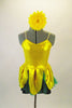 2-piece costume comes with dark green shorts &  yellow flower themed camisole dress with petals & a soft green underlay. Has yellow gerbera daisy hair clip. Front