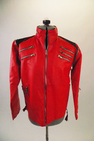 Leatherette replica of Michael Jackson's jacket worn in the video. It is lined with zippers accenting the chest, sleeves, shoulders neck & sides. Shoulders have black sequined accent. Front