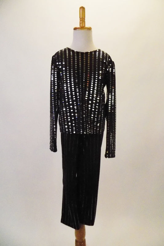 Black & silver sequined long sleeved straight cut top with a bit of sparkle is accompanied by elastic waist, silver pinstripe pants. Front