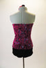 2-piece costume has pretty fuchsia and black brocade corset top with purple and crystal accents and ribbon lacing. The matching black velvet shorts have a swirled crystal accent design. Comes with matching floral hair accessory. Back