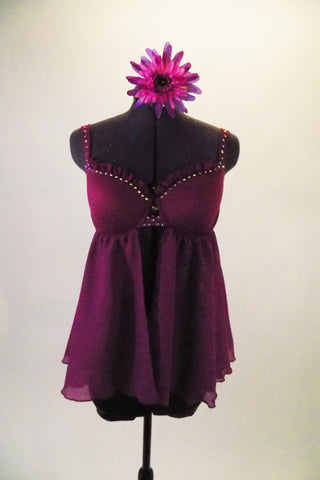 Purple baby-doll top has an open front with a cupped bra (34B) accented with crystals and ruffles. The top comes with accompanying purple shorts and matching floral hair accessory. Front