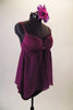 Purple baby-doll top has an open front with a cupped bra (34B) accented with crystals and ruffles. The top comes with accompanying purple shorts and matching floral hair accessory. Side