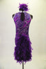 Lavender high-necked leotard has silver, purple and magenta swirls and silver collar. The back has a keyhole opening and large purple boa feather bustle. Comes with matching gauntlets and feather hair accessory. Back