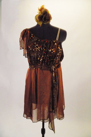 Single one shoulder dress with nude strap has shades of rich chocolate brown and sequined bodice and soft flowy chiffon shirt with built-in shorts. Comes with chiffon shoulder accent, sequined sash belt and floral hair accessory. Front