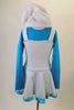 Cute little blue Smurfette costume has a turquoise top with attached white pinafore skirt with ribbon edging. Comes with fluffy white Smurf hat. Front