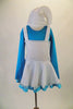 Cute little blue Smurfette costume has a turquoise top with attached white pinafore skirt with ribbon edging. Comes with fluffy white Smurf hat. Back