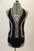 Sassy Broadway-inspired two-piece black and silver costume has a halter vest-style black top with a silver braided accent. The sequined front insert is accented by loads of crystals. Comes with matching black briefs and silver banded bowler hat. Front