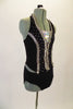 Sassy Broadway-inspired two-piece black and silver costume has a halter vest-style black top with a silver braided accent. The sequined front insert is accented by loads of crystals. Comes with matching black briefs and silver banded bowler hat. Side