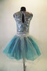 Sparking silver tutu dress has sleeveless sequined bodice with V-front and keyhole back. The attached turquoise and silver tulle skirt with silver cummerbund balances the sparkly bodice. Comes with hair accessory. Back