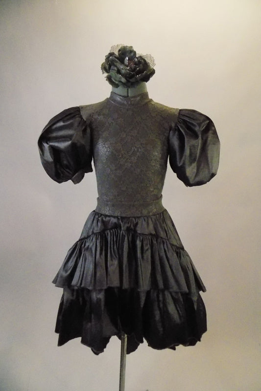 Pewter two-piece costume is a lace leotard with large taffeta pouffe sleeves. And deep open back. The matching layered high-low taffeta skirt has lace waistband. Comes with a pewter floral hair accessory. Front