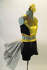 Gold & black two-piece costume has a gold and black half top. The bottom is black shorts with gold waistband and attached black-white-gold tulle bustle skirt.Comes with matching gold hair accessory.Side