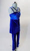 Two piece costume features a blue velvet camisole, open back tunic top with crystal buckle accent and cross front straps. Comes with matching blue velvet pants and hair accessory. Side
