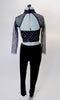 This modern two-piece costume has black velvet pant is paired with a silver and black high neck, geometric print half top with long fishnet sleeves and open back. Comes with a silver hair accessory. Back