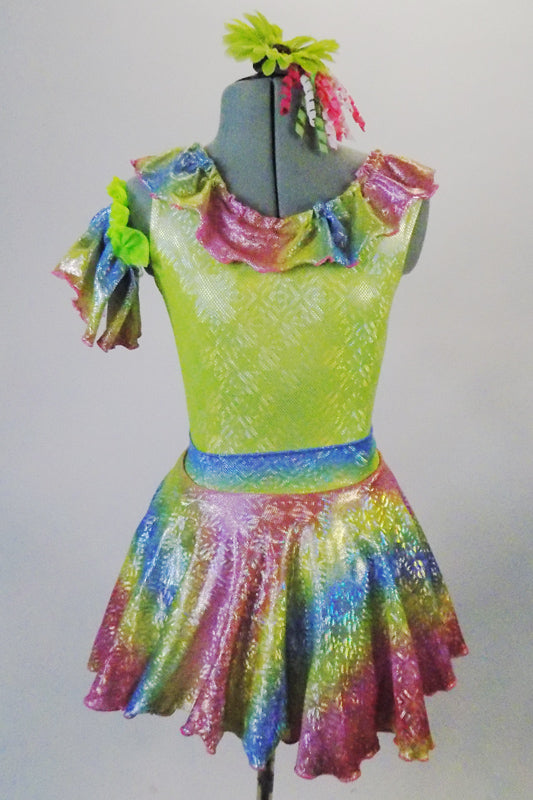 Iridescent dress has pale green bodice with rainbow coloured ruffles around the neckline and matching skirt. The neon green petticoat gives the skirt a nice fullness.  Comes with matching ruffled armband floral hair accessory. Front