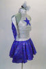 Cowboy themed, silver and blue dress has a halter-necked silver leotard with a blue sequined star at front. The blue sequined pull-on skirt has attached petticoat for fullness. Comes with matching blue fringed silver armbands and silver hair accessory. Side