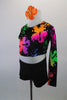 This fun two-piece costume has a black long-sleeved half-top covered in colourful splatter design. The top is complemented by black booty shorts and comes with matching hair accessory. Side