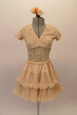 Ivory-Blush lace leotard has cross-over empire cut and cap sleeves. The matching skirt is a multiple layered, ruffled petticoat style simple yet very soft and feminine. Comes with a floral hair accessory. Front