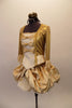 Baroque gold ballet costume has gold brocade over-lay that reveals a ruffled petticoat. The gold 3/4 sleeved top has brocade ruffle & gold bows. The front bodice has princess cut “V” front with peplum and brocade center panel accented with gold bows and grommet back lace back. Left side