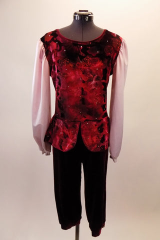 Two-piece costume has a medieval fairy-tale theme. The burgundy cuffed knicker pants compliment the burgundy floral tunic peplum top with pink chiffon long pouffe sleeves and crystal accents. Front