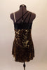 Single shoulder dress has black bodice accented with crystals and ring accent at one shoulder and a nude elastic on the other. The skirt portion is entirely covered in small square gold sequins that make the costume pop on stage. Comes with matching hair barrette. Back
