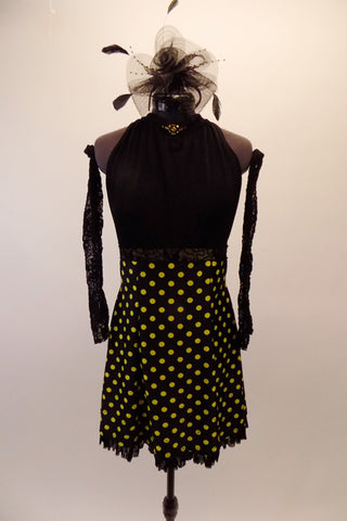 Black gathered halter bodice has greenish crystal accents at high neck and lime yellow polka dots skirt with lace waistband. The matching lace gauntlets and black headband accessory completes the look. Front