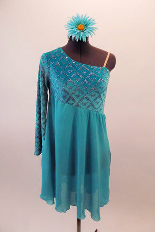 Turquoise long single sleeved, off shoulder A-line dress, has velvet glitter pattern sleeve and bodice with chiffon skirt.  The neckline is lined with crystals and nude elastic reinforces the left shoulder. Comes with a floral hair accessory.  Front