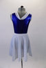 Naval themed two-piece costume has a royal blue metallic effect leotard with triangular gold inlay at bust. The white naval collar compliments the accompanying knee length skirt with crystal anchor detail. Comes with matching captain’s hat. Back