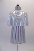 Soft and light silver flowing dress is simple with round neckline and empire waist. It comes with a crystalled silver removable poncho.  Front